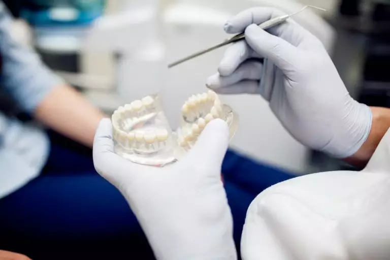 Which is better, a crown or an implant?
