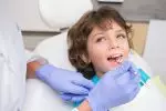 Удаление молочных зубов у детей